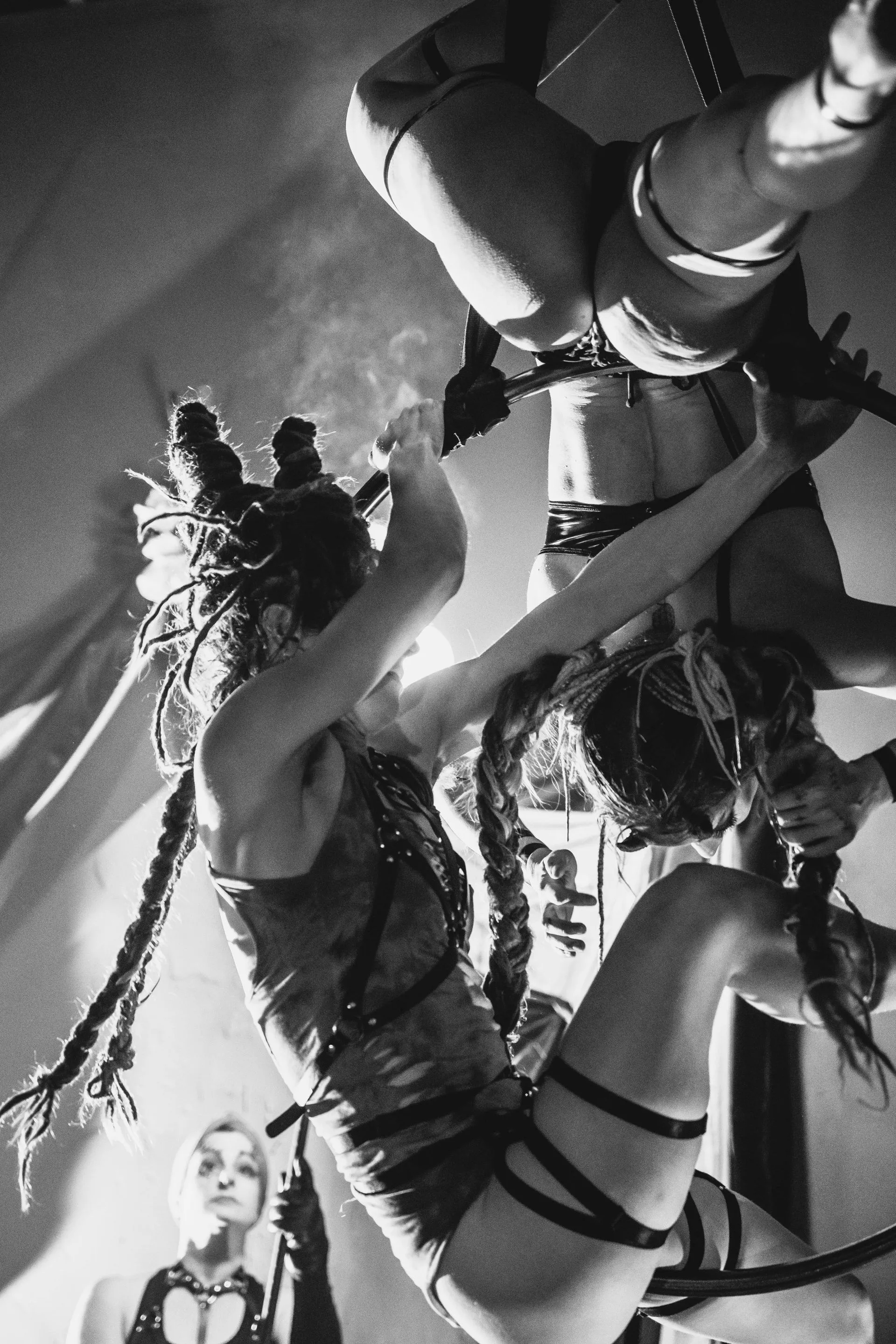 A black and white photo of two women dancing